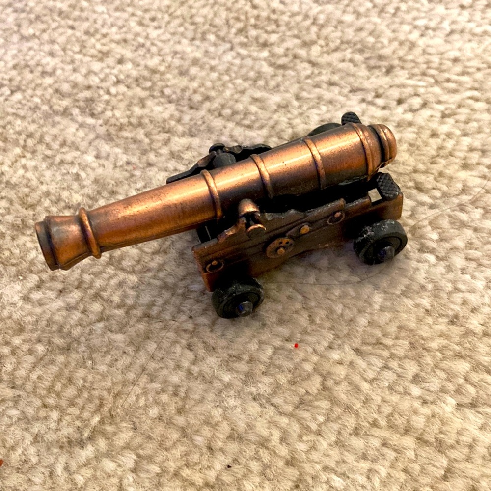 Copper miniature cannon pencil sharpener. Was a souvenir.